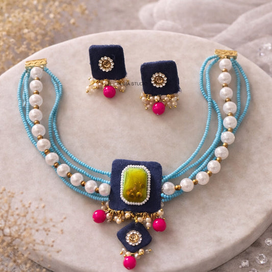 NAVY BLUE FABRIC MULTI LAYERED BEADED NECKLACE WITH STATEMENT STONE PENDANT