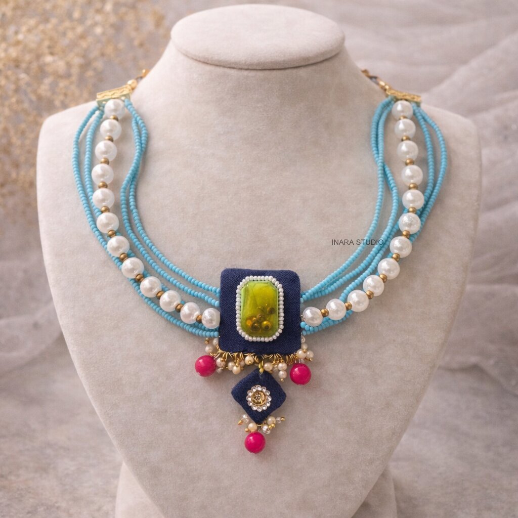 NAVY BLUE FABRIC MULTI LAYERED BEADED NECKLACE WITH STATEMENT STONE PENDANT