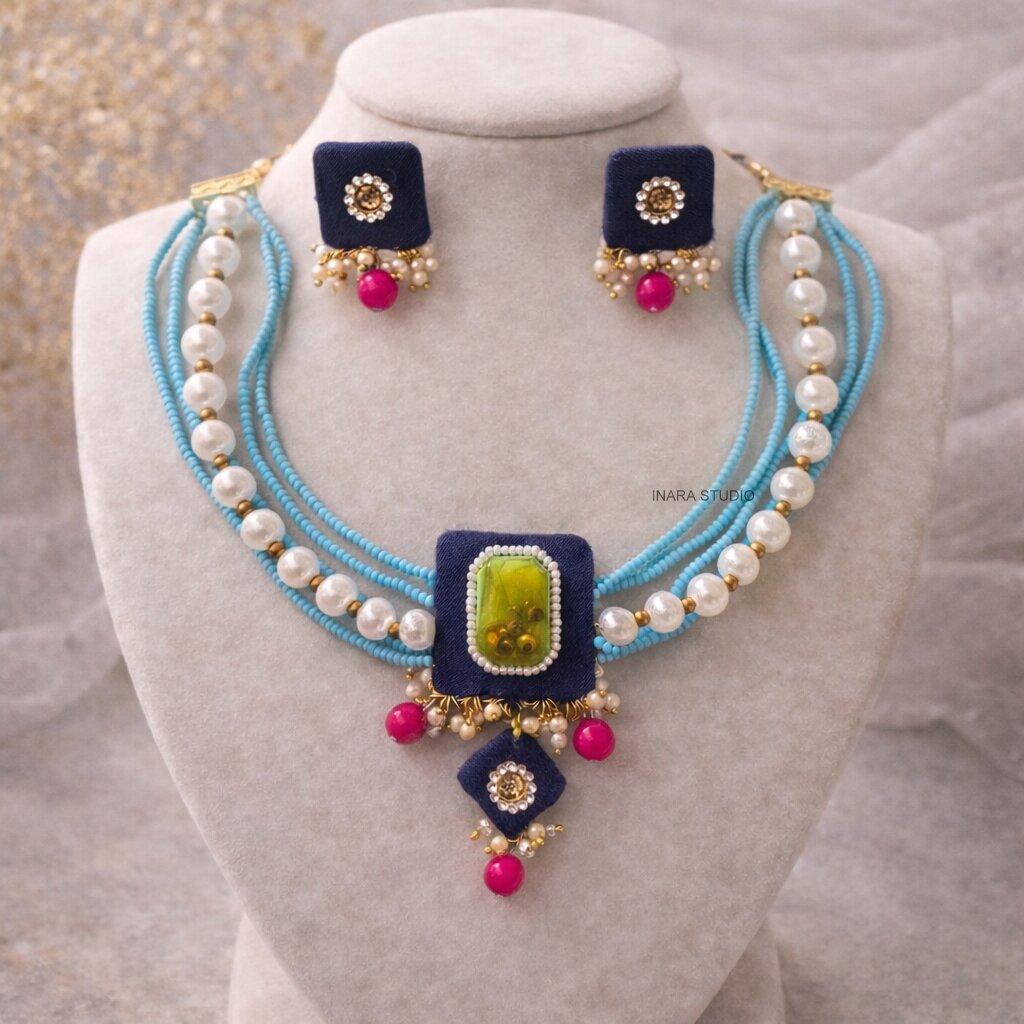NAVY BLUE FABRIC MULTI LAYERED BEADED NECKLACE WITH STATEMENT STONE PENDANT